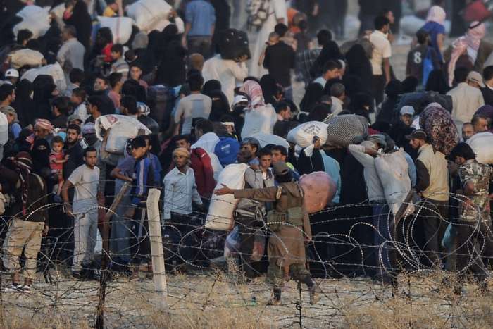 Сирійські біженці масово переходять на територію Туреччини (26 фото)